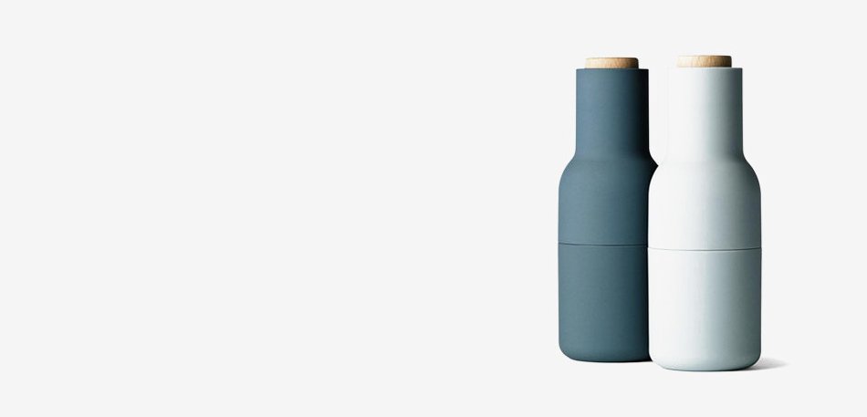 Two carved bottles with wooden corks, grey-blue and white