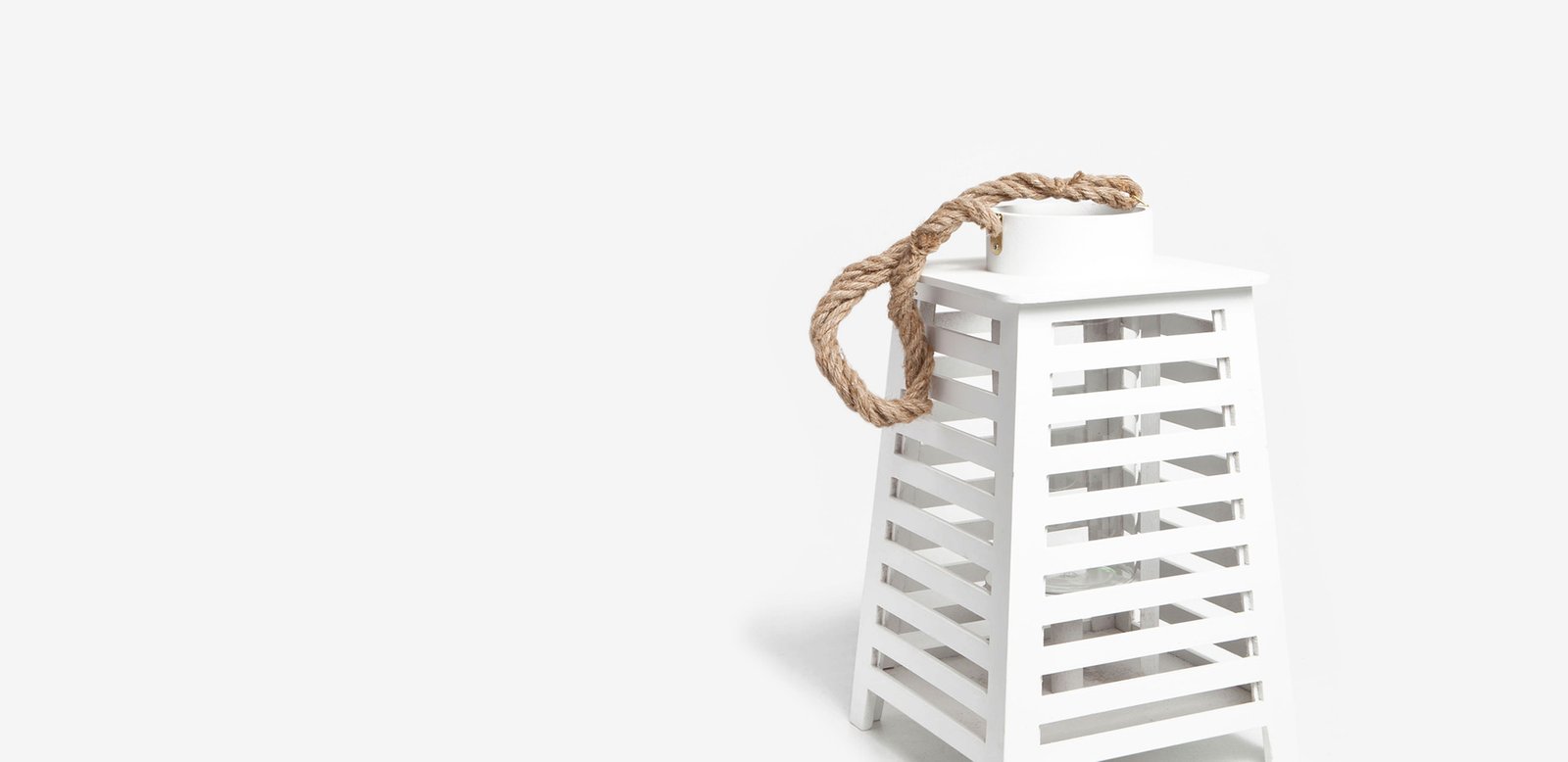 White slatted lantern with a braided jute rope handle
